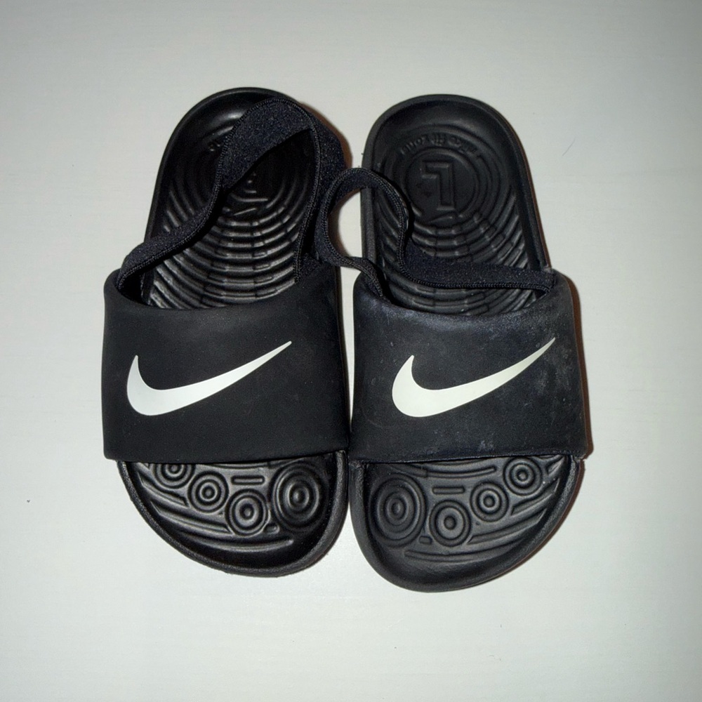 Nike Kids Black Slide Sandals with White Swoosh Accent